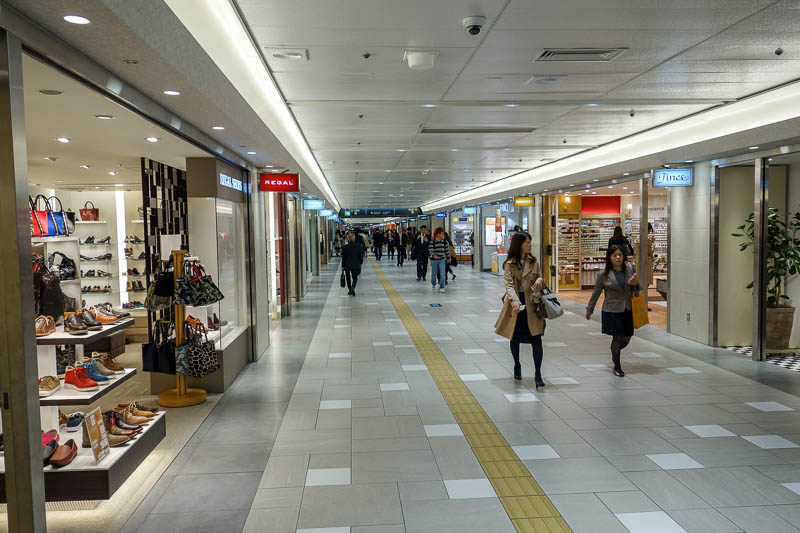 Japan 2015 - Tokyo - Nagoya - Hiroshima - Shimonoseki - Fukuoka - The malls under the twin towers are a lot more modern and shiny, with a whole heap of starbucks stores.