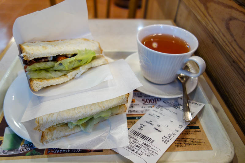 Japan-Nagoya-Rain-Toyota - So I headed into Cafe Pronto for a toasted sandwich and cup of tea. This was really nice, and very cheap. I think one half was peppered pork, whatever