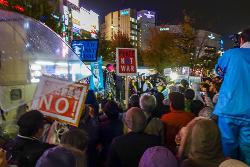 Japan 2015 - Tokyo - Nagoya - Hiroshima - Shimonoseki - Fukuoka - Then I happened on a peace protest. Out the backside of the station there were police everywhere and the streets were all closed off. I dont think it 
