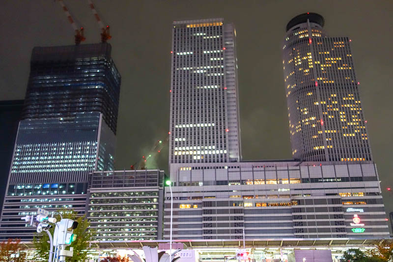 Japan 2015 - Tokyo - Nagoya - Hiroshima - Shimonoseki - Fukuoka - The tops of the big buildings were ascending into the cloud.
