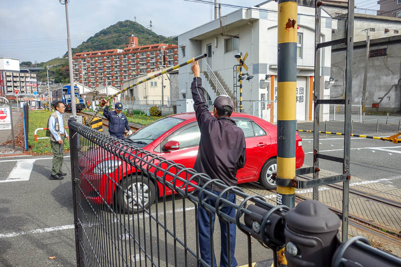 Japan-Shimonoseki-Hiking-Shrine-Hinoyama - Now for todays hilarity. This woman ignored the flashing lights for the rail crossing, and got stuck between the gates. You can see the train in the b