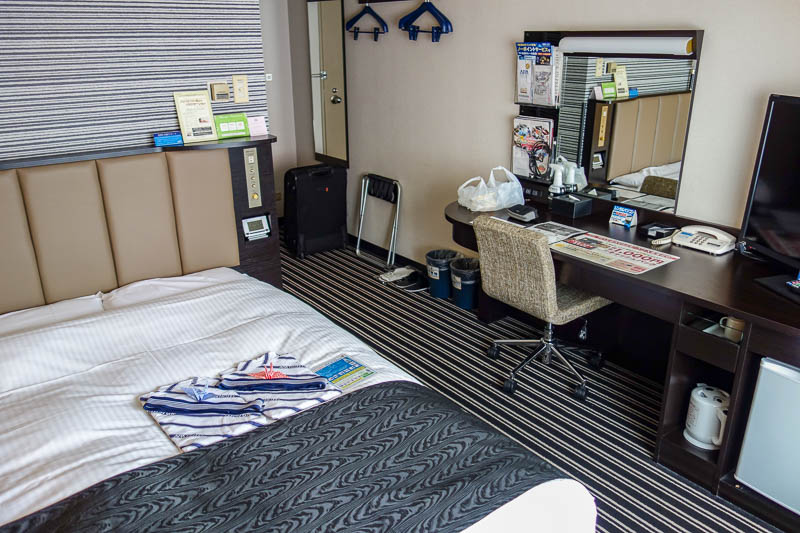 Japan 2015 - Tokyo - Nagoya - Hiroshima - Shimonoseki - Fukuoka - This is my room, probably the nicest room I have had so far. Its a bit dated but has been done up. Paper cranes on the bed.