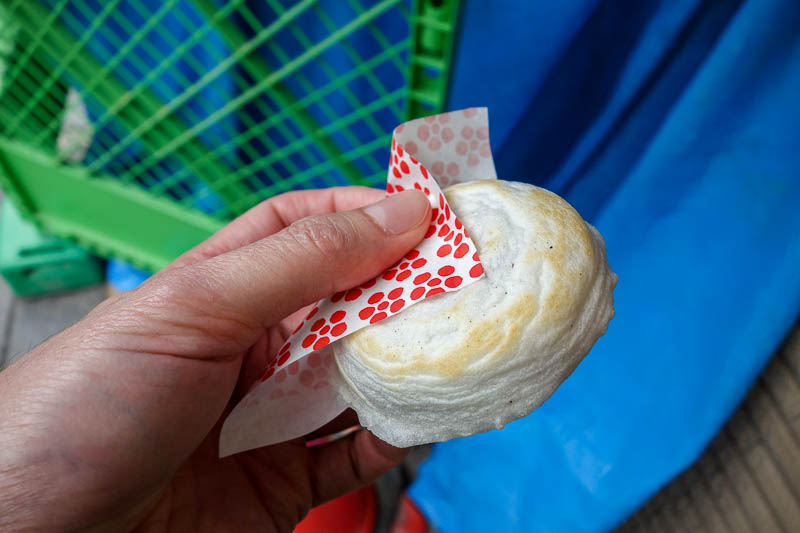 Japan-Fukuoka-Hiking-Mount Homan-Dazaifu - This seems to be the local snack, so I got one. Its red bean again, but unsweetened. The crispy shell was also not sweet, but it was hot as hell.
