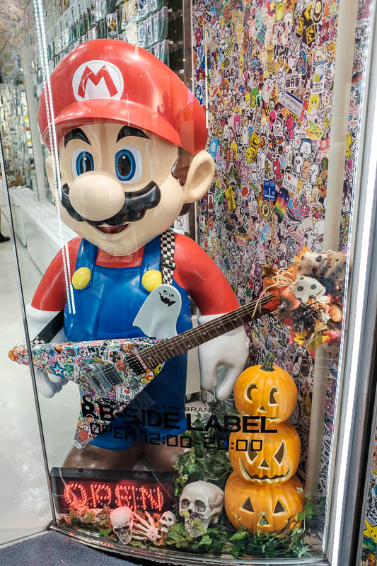 Back to Japan for even more - Oct and Nov 2017 - Mario is peaking right now. Here he is playing a guitar. I may have photographed this before! But was he playing a guitar before? Who knows.