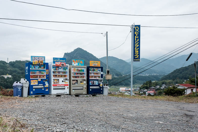 Japan-Hiking-Torisawa-Mount Ougiyama-Momokurayama - This is where the road starts at the end of the trail. These vending machines have a fantastic view. I tried to make the photo look old timey somethin