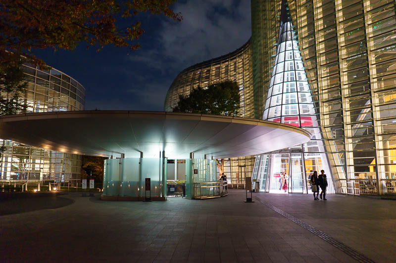 Japan-Tokyo-Roppongi - This is the art gallery. They have glued a Christmas tree over the door and placed a flying saucer in the courtyard. It's going to be an alien invasio