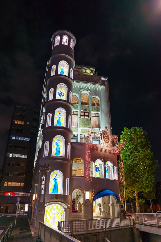 Japan-Tokyo-Roppongi - I got so lost I ended up in strange wedding dress world. This building stands out on its own and the stuff in it looks cheap. Weird.