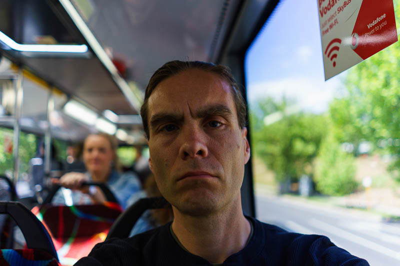 Of course I am back in Japan yet again - Oct and Nov 2018 - Here I am on the bus. The woman behind me was photo bombing. Little does she know that my new camera has a sensor about as big as my head, so everythi