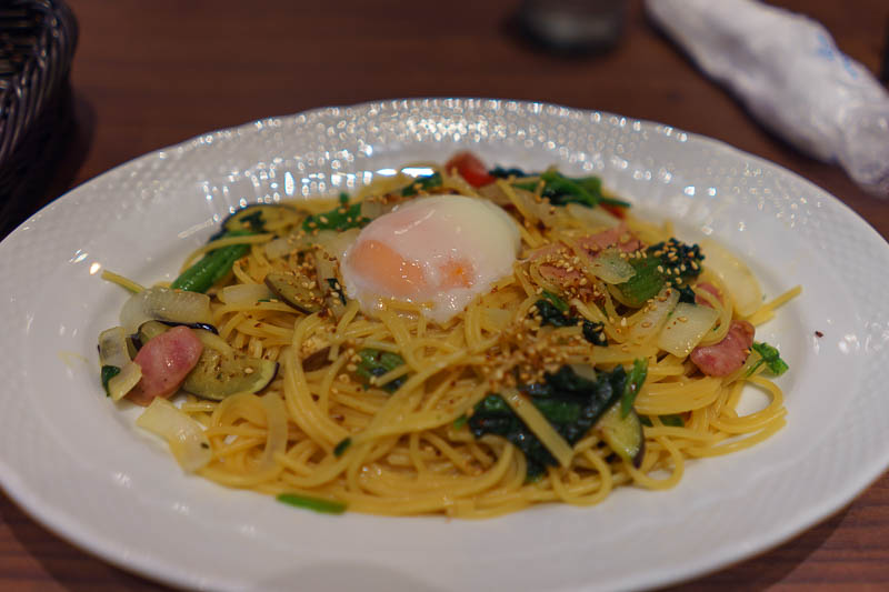 Japan-Okinawa-Naha-Beach - For dinner tonight, Japanese pasta. It is soy sauce flavoured, with an almost raw egg on top. Also Chinese sausage. I think I have now had all the mai