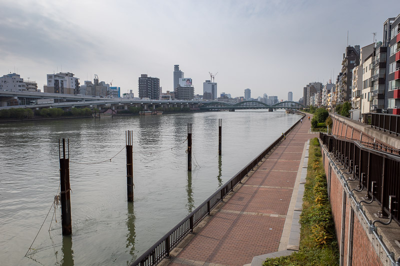 Japan-Tokyo-Sumida River - The mighty, hazy, Sumida river. Note the lack of people, I think theres a grand total of 2 in this shot.