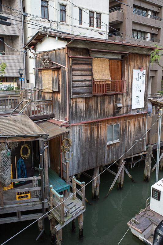 Japan-Tokyo-Sumida River - I assume these were the old houses of old fisherman. Probably all craft beer places now, or vape huts.