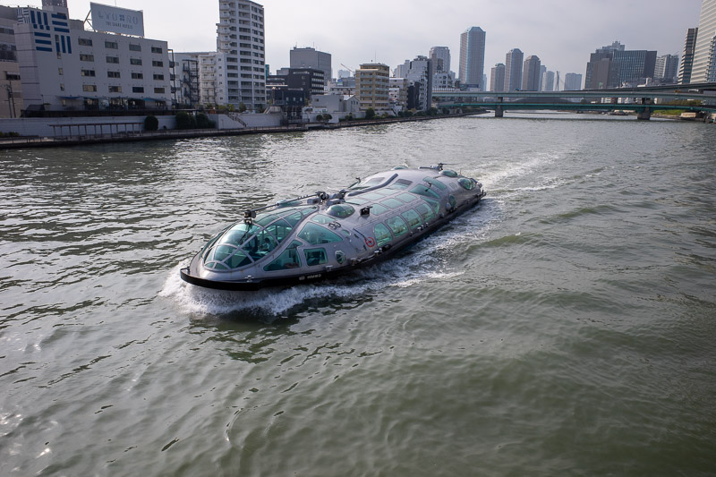 Japan-Tokyo-Sumida River - FUTURE BOAT IS HERE TO SAVE US ALL. Many of the bridges are very low, they therefore have to design a boat that sits very low, and can have bow waves 
