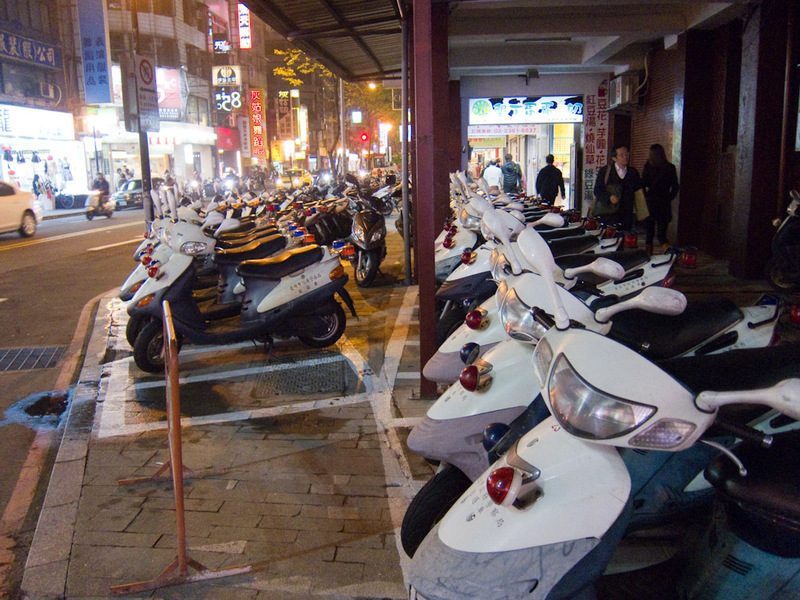 Taiwan-Taipei-Ximending-Night Market - Police scooters as far as the eye can see. Imagine if our motorbike cops were given scooters. There would be a strike. Someone would get shot. They pr