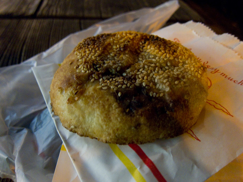 Taiwan-Taipei-Night Market-Shilin - I got one peppered pork and a black sesame for dessert. Fantastic, a bit like a pide but a smoky flavour with pastry like a pizza base out of a wood o