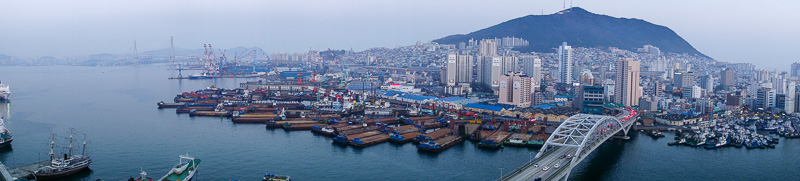 Korea again - Incheon - Daegu - Busan - Gwangju - Seoul - 2015 - Panorama number 1, not shot from a mountain, but a roof. Not sure what those barges are.