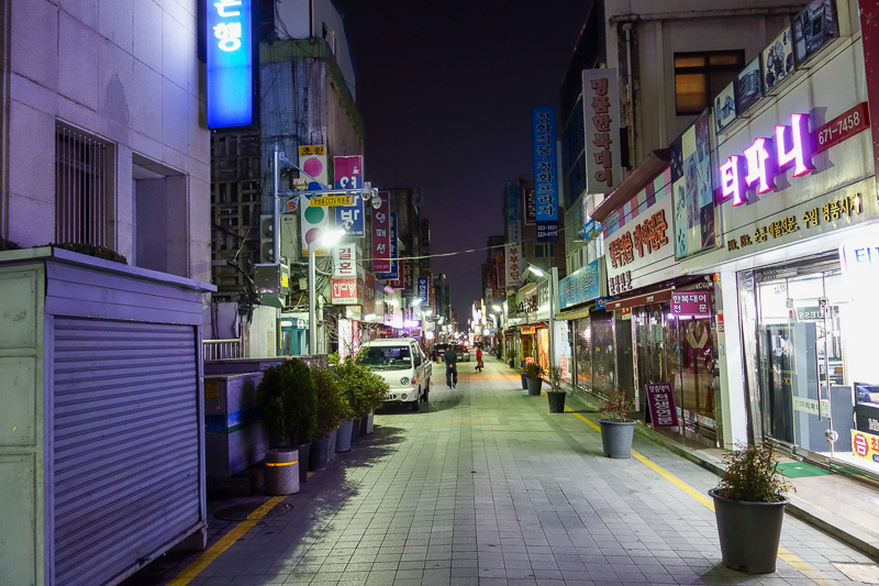 Korea again - Incheon - Daegu - Busan - Gwangju - Seoul - 2015 - And now tonight, the anti neon! This is a pedestrian street, but its dark and closed. Closer inspection reveals it to be wedding dress street. So my t