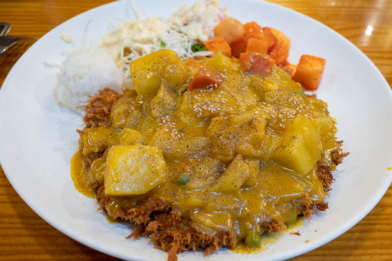 Korea-Seoul-Namsan-Curry - My very unappealing looking dinner was delicious, but huge. I is a tonkatsu style pork cutlet thing covered in curry. Koreans love all parts of the pi