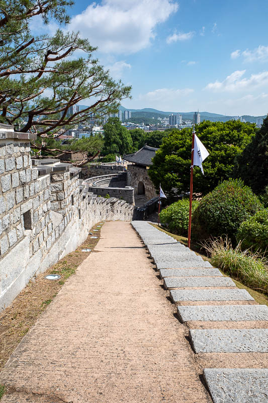 Korea-Suwon-hwaseong fortress - There are 4 main gates but probably 8 smaller ones. I think this is a smaller one, I read signs that went on about bastions and turrets and what not, 