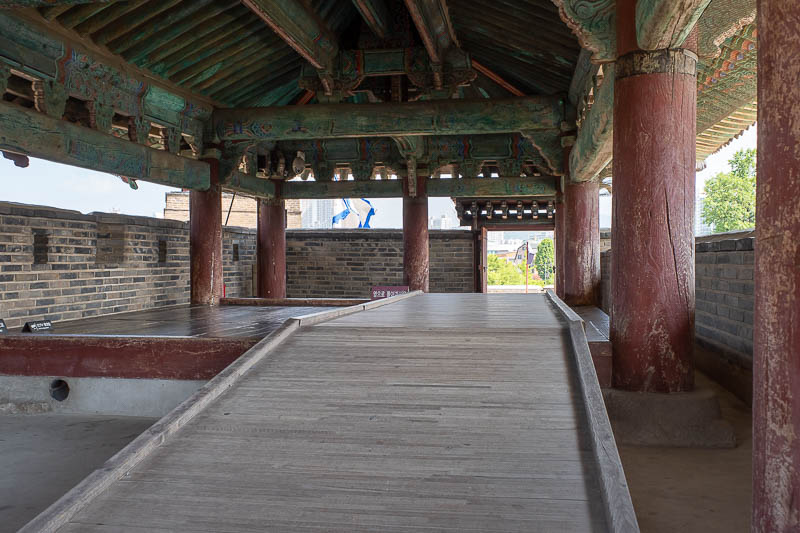 Korea-Suwon-hwaseong fortress - Many of the wooden structures require you to remove your shoes, so I walked around them.