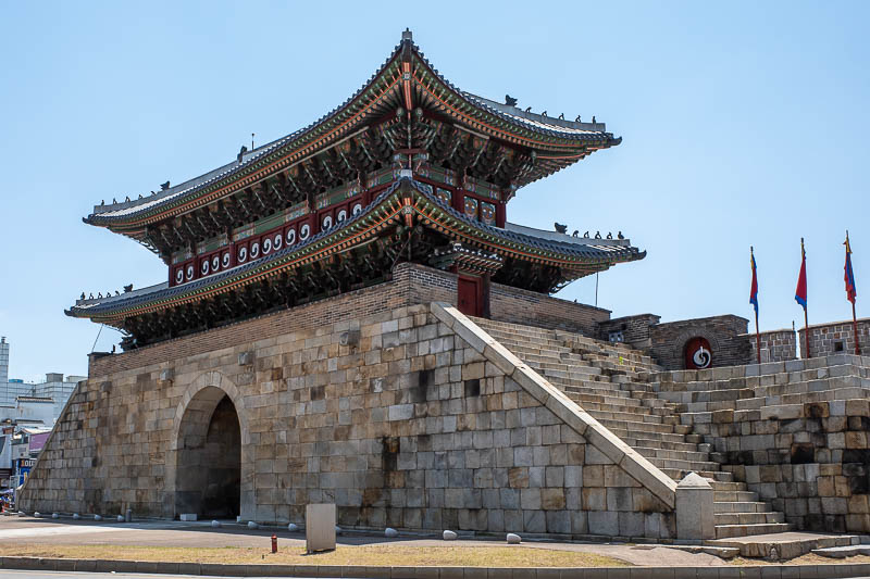 Korea-Suwon-hwaseong fortress - Here is part of the wall that is no longer connected to the wall, right in the middle of the old market. It is probably the biggest of the gates.