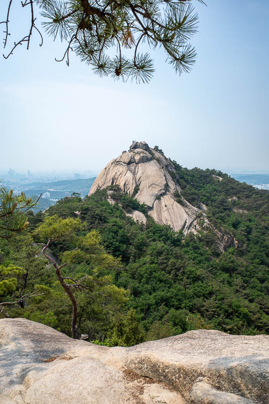 Korea-Seoul-Hiking-Bukhansan - OK, back to business, here you can see across the way, the peak I tried to find a path down. I was trying to find a path down that sheer rock face. No