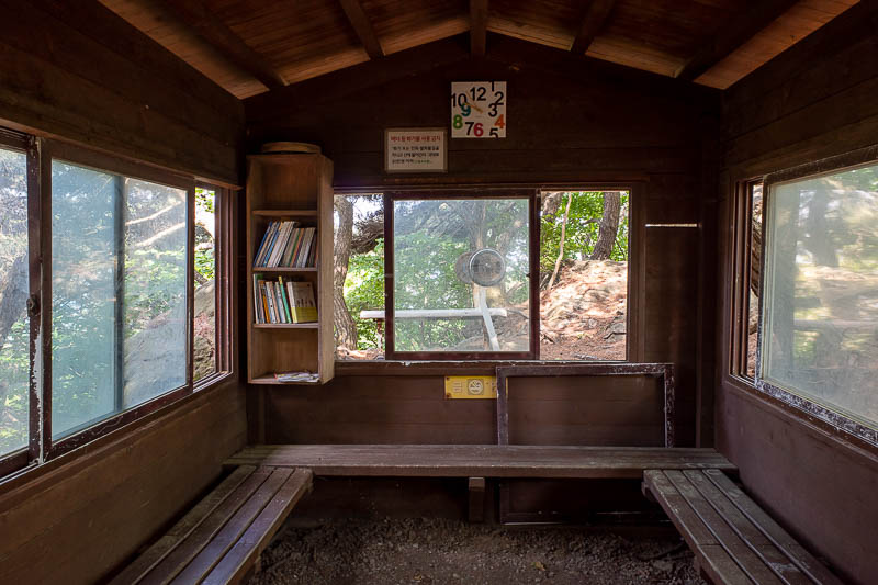 Korea-Suwon-Hiking-Gwanggyosan - Near the deepest point in the mountains, this hut, with a selection of books to read. Pretty cool.