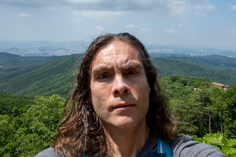 Korea-Suwon-Hiking-Gwanggyosan - After fleeing the army, it is time for the selfie. Although you can see more army base over my right shoulder.
