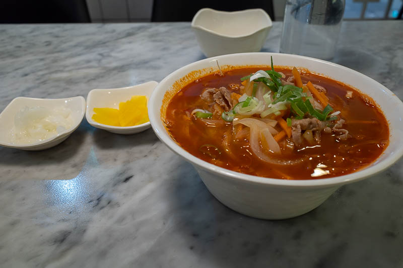 Korea-Daegu-Food-Shopping - I found a place in the basement for a great early dinner. Some sort of spicy beef soup... with kim chi. Basically pho with kim chi and more chilli. I 