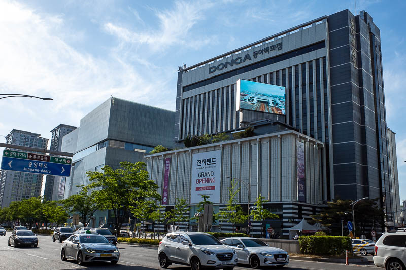 Korea for the 4th time - May and June 2022 - The store on the right appears to be called Donga, and despite saying grand opening is not new. To the left, the borg cube looking thing is the Hyunda