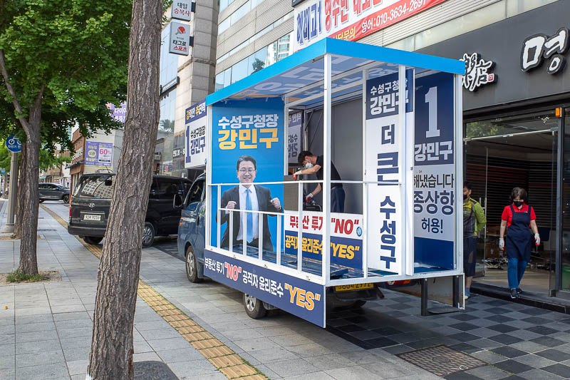 Korea-Daegu-Busan-Train - My Daegu hotel was in a street full of shops selling loud karaoke gear. It seems they rented it all out to election trucks. Election over, hundreds of
