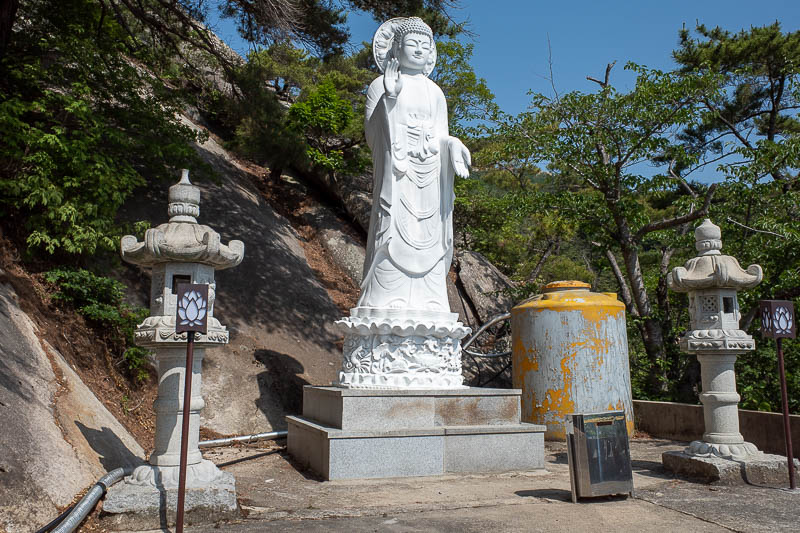 Korea-Busan-Hiking-Geumjeong - One of many Buddha's. I enjoy this one because he is perched next to a septic tank.