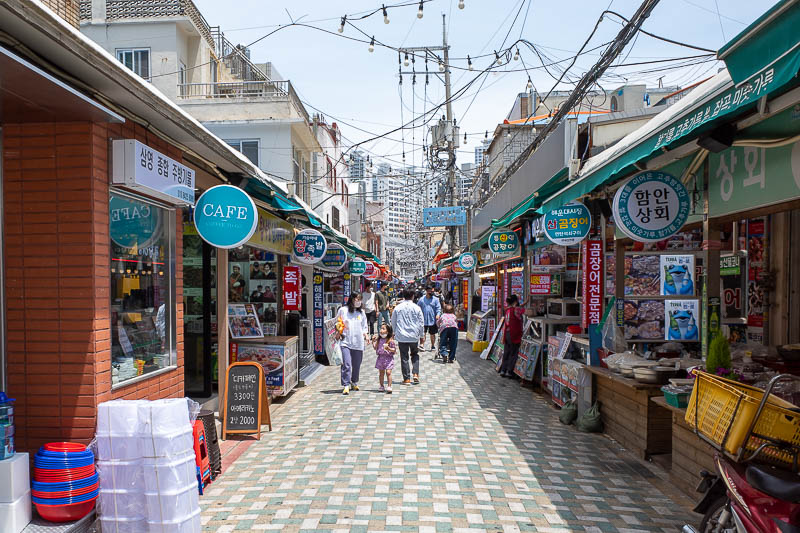 Korea for the 4th time - May and June 2022 - There is a traditional market street, mainly deep fried seafood in batter, but also sock shops for some reason, huge shops selling thousands of socks.