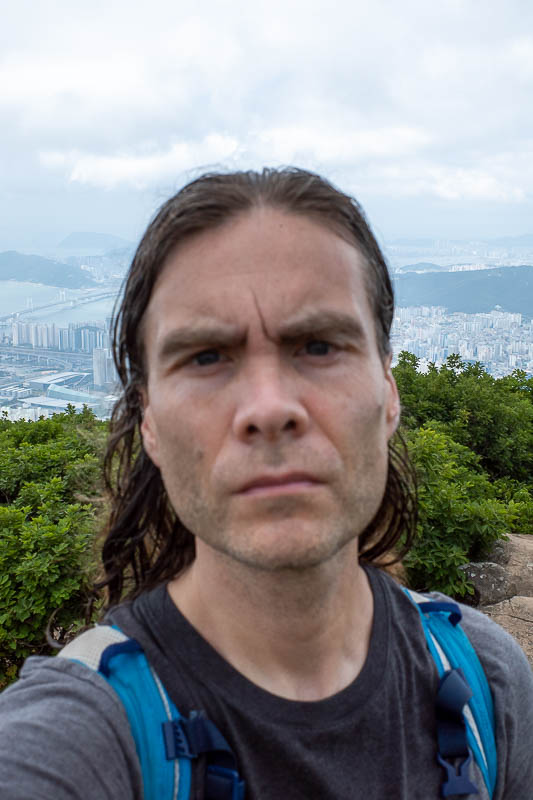 Korea-Busan-Hiking-Jangsan - Serious face today. I had to get back down without breaking my neck! Slightly out of focus, my facial crevices lack definition.
