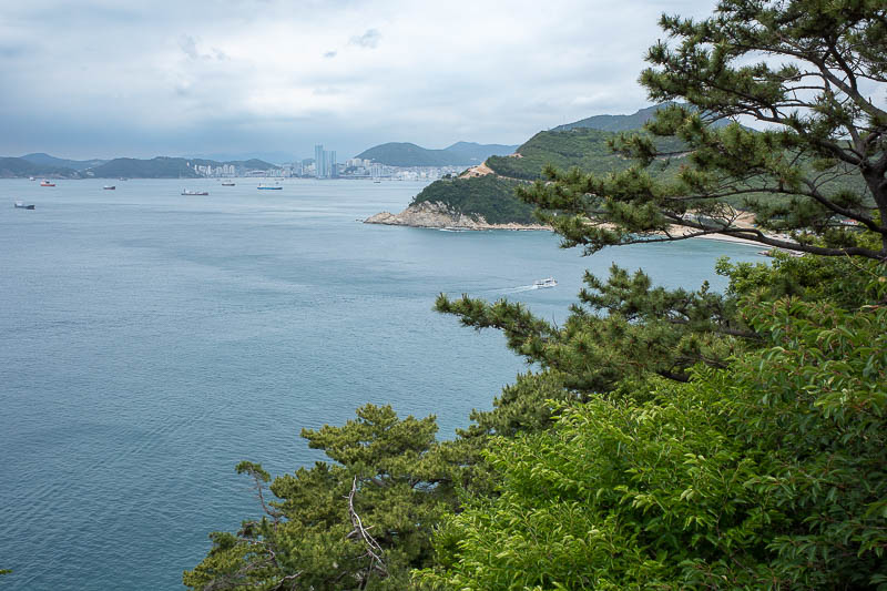 Korea-Busan-Hiking-Taejongdae - Some nice views to be had from here as well. The little boat is one of the ferry's that takes you around the resort.