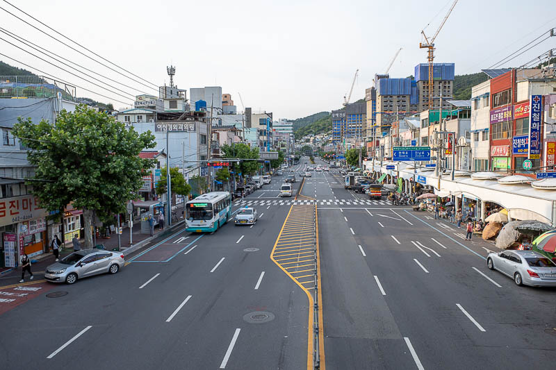 Korea-Yeosu-Food-Schnitzel - I love an overpass. One of the many markets on the right. There are a few canals running through the city with markets backing onto them. I assume the
