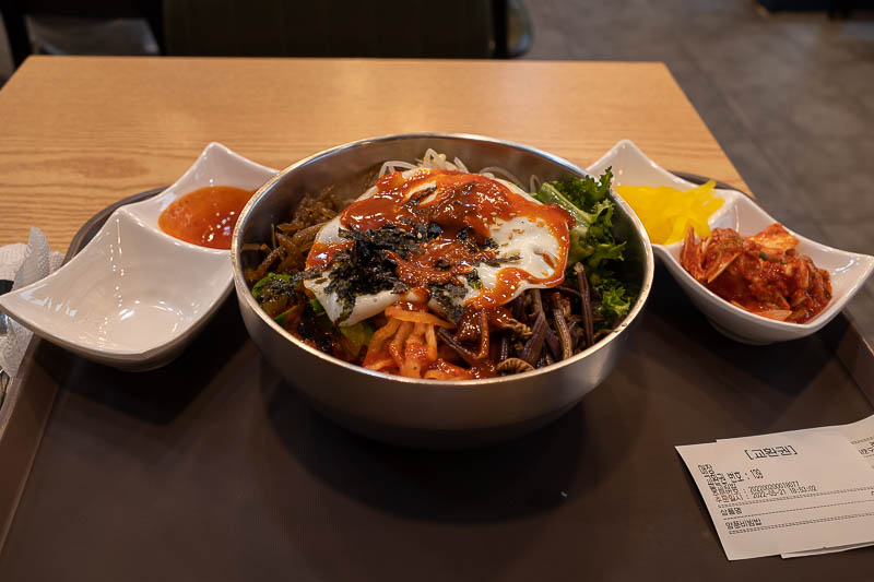 Korea-Seoul-Hongdae-Bibimbap - I had to go about 6 blocks back to find a place to eat at, I settled on the local grandma run standard Korean food outlet. These all have basically an