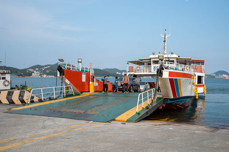 Korea-Yeosu-Food - Here is the only ferry I have seen the whole time I have been here. Scabs! It is arriving at an unmarked boat ramp.