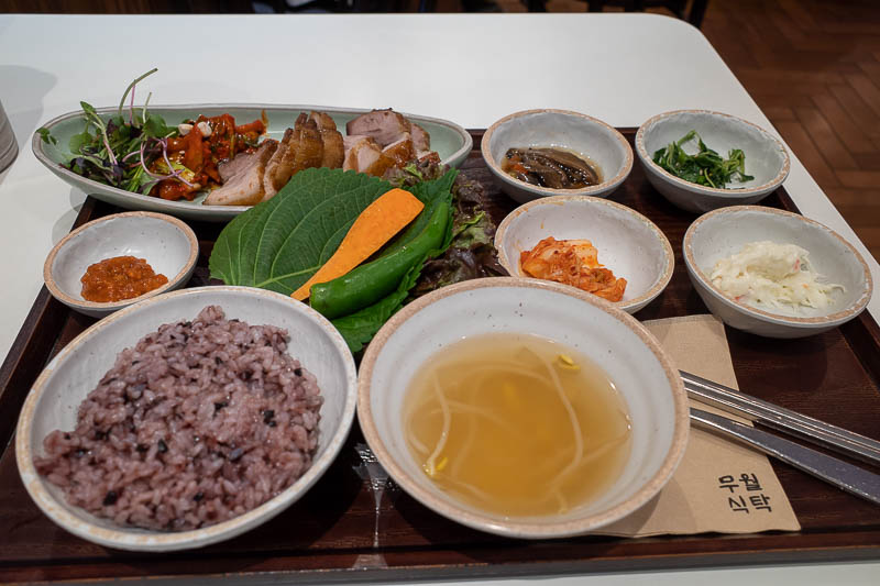 Korea-Seoul-Food-Pork - Here is my dinner. A very typical Korean meal. The pork is apparently 'boiled'. I believe you are supposed to wrap various things into the leaves in t
