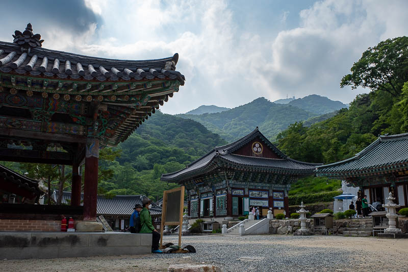 Korea-Seoul-Hiking-Yongmunsan - I was glad to arrive back at the temple. If you look closely you can see those military structures on the mountain peak between the two peaks.