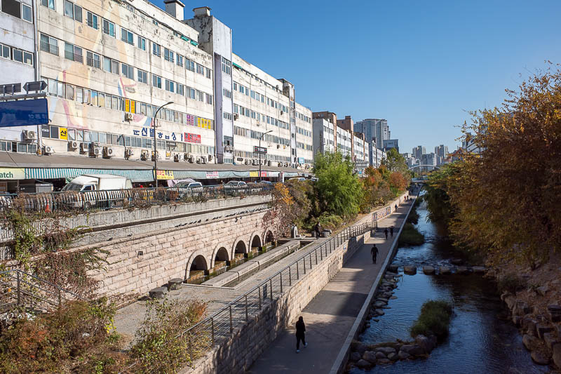 Korea twice in one year - November 2022 - OK, here's more sewer park, but note the buildings on the left, there are a lot more behind me too. These are above things like the shoe market, umbre
