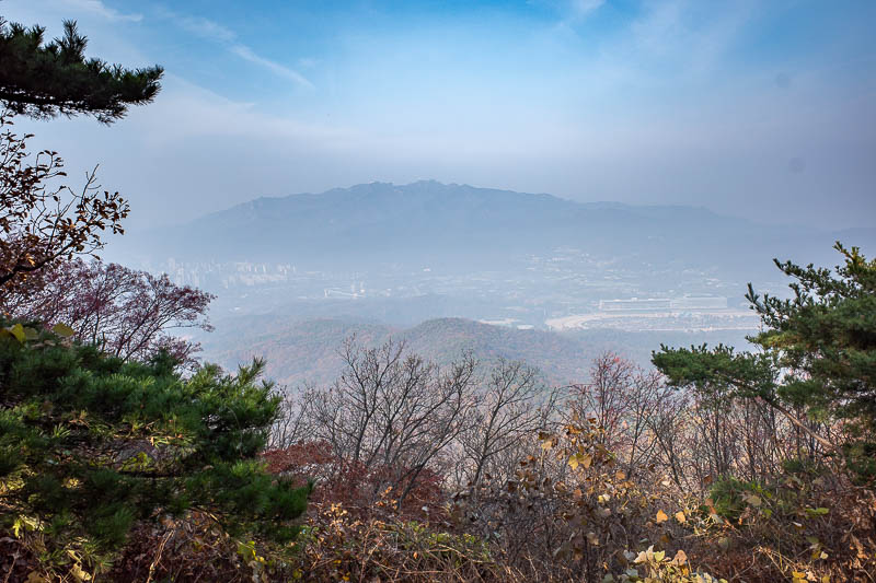 Korea-Seoul-Hiking-Cheonggyesan - First view might be the clearest of the day. I did what I could to see through the smoke with the dehaze slider in lightroom.