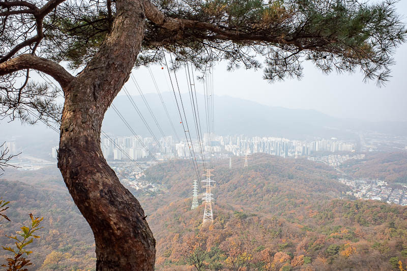 Korea-Seoul-Hiking-Cheonggyesan - Power lines make an otherwise ruined view bearable.