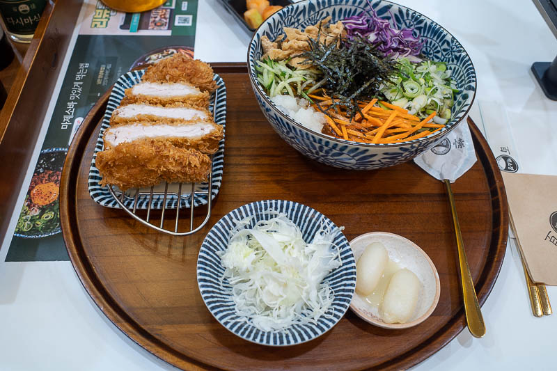 Korea-Seoul-Gangnam - My dinner. Pork cutlet seems to be the main thing in Korea now. I chose the option with the vegetables, but that did mean cold soba underneath. So col