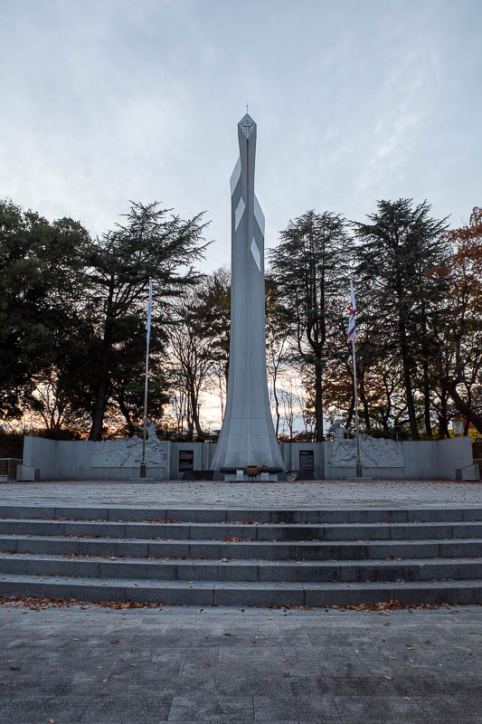 Korea twice in one year - November 2022 - OK, before going to the observatory, I had to go to the martyr monument. At the bottom of this hill a religious group were doing a candlelight vigil p