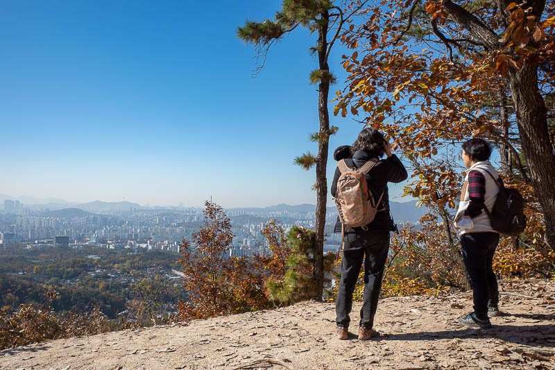 Korea-Seoul-Hiking-Bulamsan - Hanging out with a couple of ladies enjoying the view.