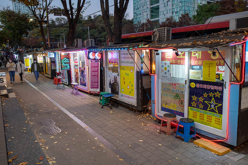 Korea twice in one year - November 2022 - These are all tarot reading booths set up on the road. And this is not all of them, there are hundreds of them stretching for at least a kilometre. We