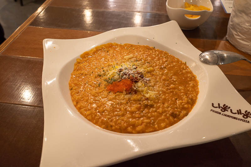 Korea-Seoul-Yongsan - My dinner is a very spicy risotto. This fusion of a Korean stew and risotto seems very popular with multiple different chains specialising in it, so I