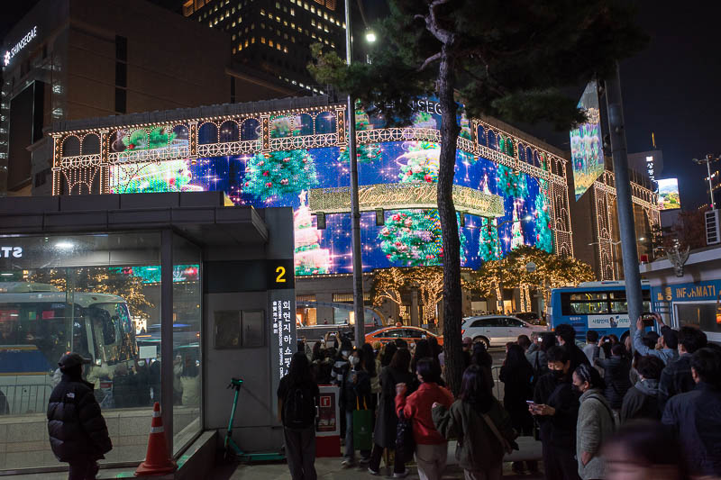 Korea twice in one year - November 2022 - Last pic, the Shinsagae has taken xmas lights to the next level with a full wrap around video screen coordinated with all the lights in trees and on t