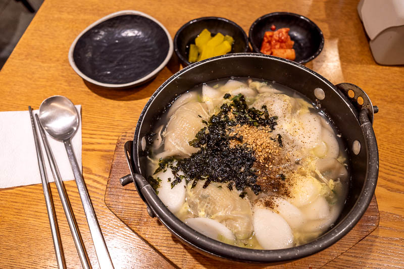 More of the same of Korea - March and April 2024 - Instead I had the cheapest meal of the trip so far. About $5 for a huge bowl of huge mandoo dumplings. Those white slices of rubber looking things, I 