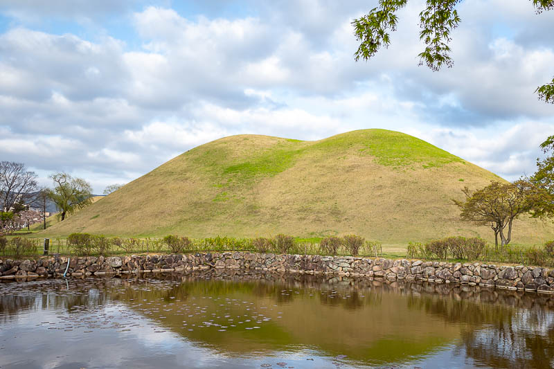 More of the same of Korea - March and April 2024 - Let's start with some tomb mounds. Here are some mounds with a pond.